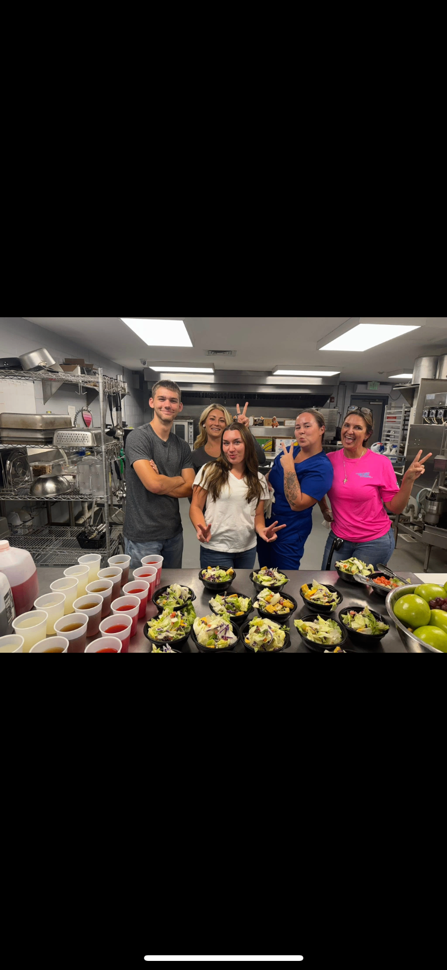 Volunteer team preparing fresh meals in the kitchen